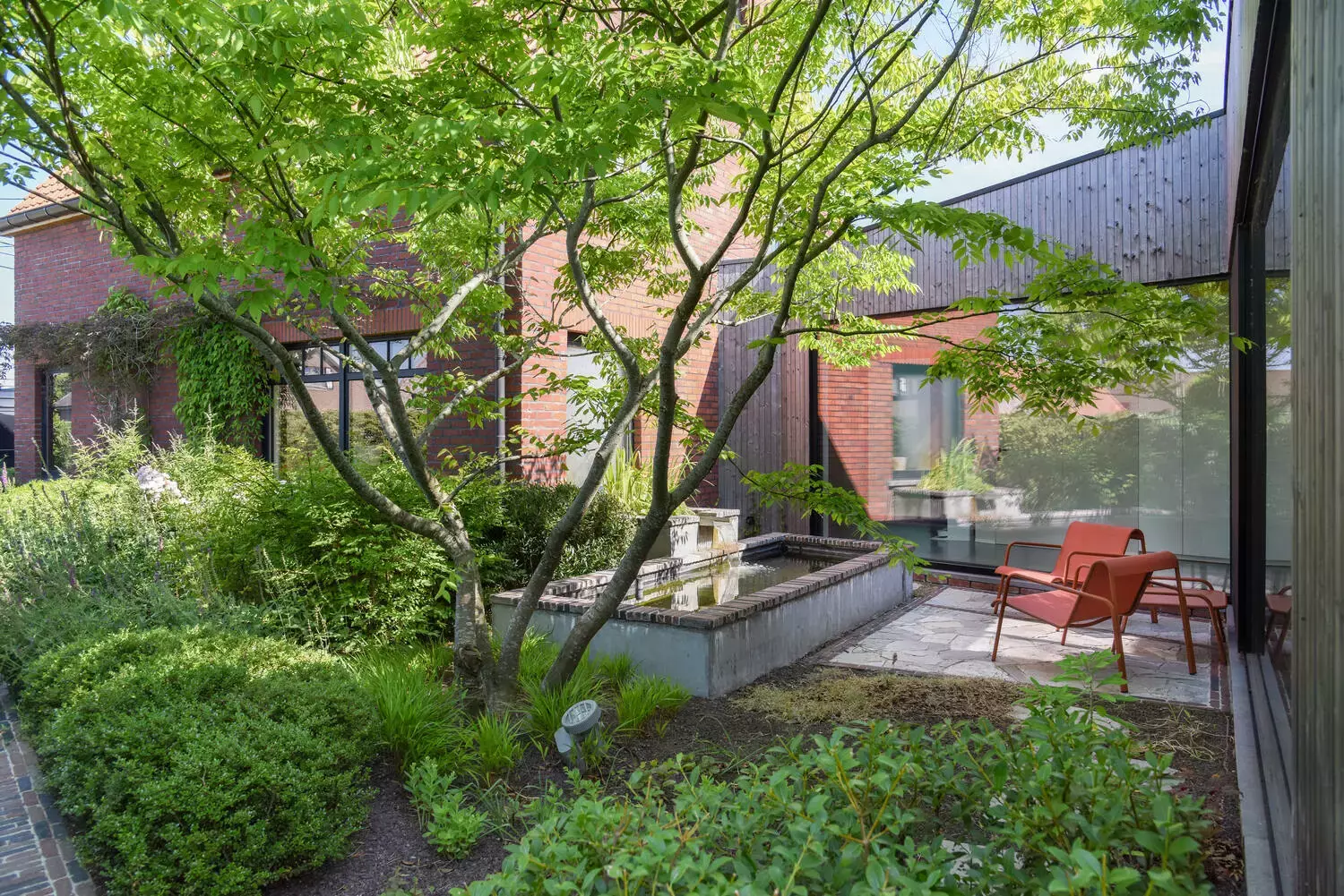 Natuurlijke tuin met bloemenweide - Tuinaannemer.be