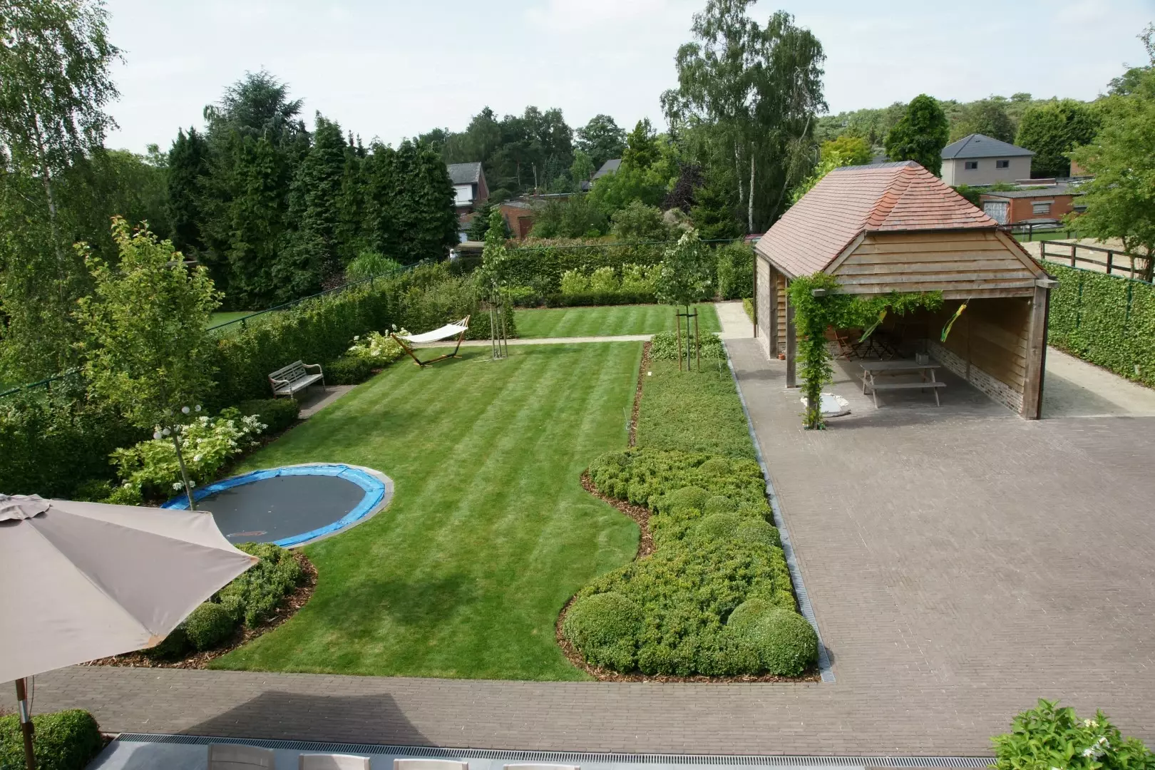 Onderhoudsarme familietuin - Tuinaannemer.be