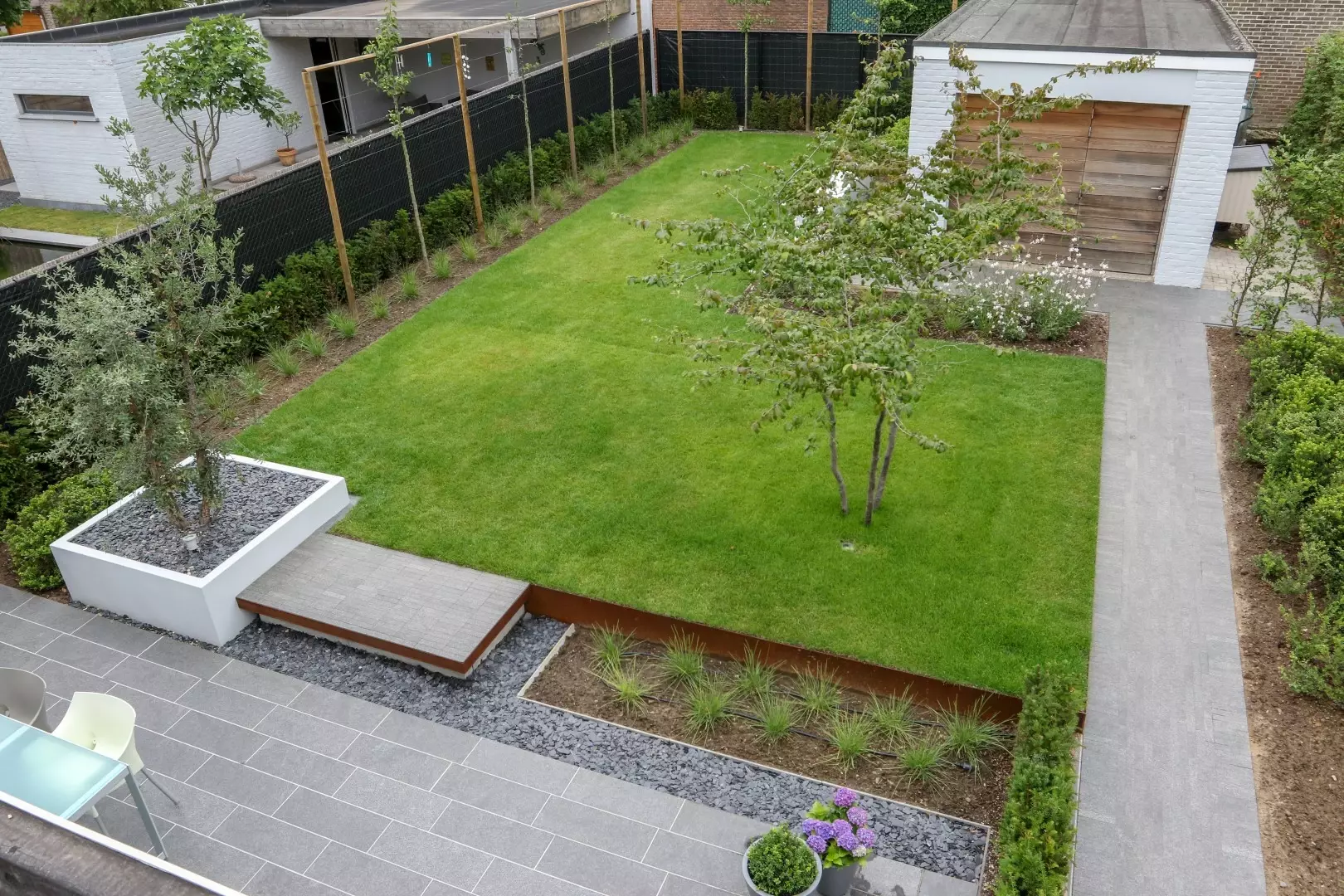 Modern onderhoudsvriendelijk tuinontwerp - Tuinaannemer.be