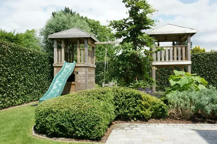 Kindvriendelijke tuin met zwembad - Tuinaannemer.be