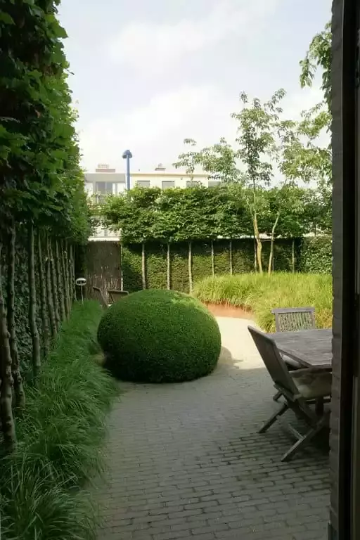 Tuin met hoogteverschillen - Tuinaannemer.be