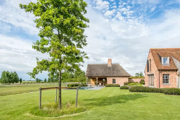 Landelijke tuin met boerderijdieren - Tuinaannemer.be