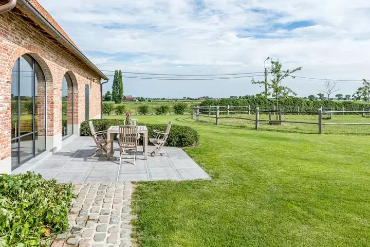 Landelijke tuin met boerderijdieren - Tuinaannemer.be