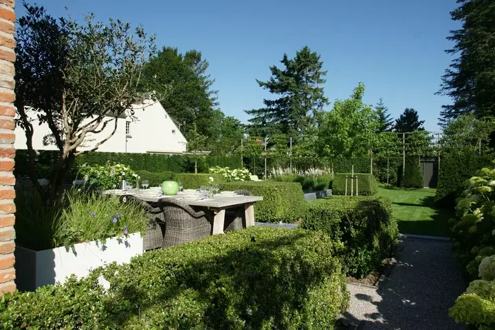 Moderne tuin aanleggen op zandgrond - Tuinaannemer.be