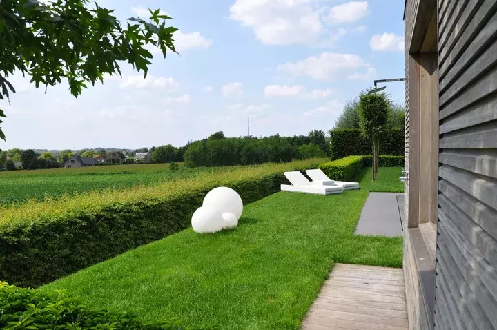 Zuidgerichte achtertuin - Tuinaannemer.be
