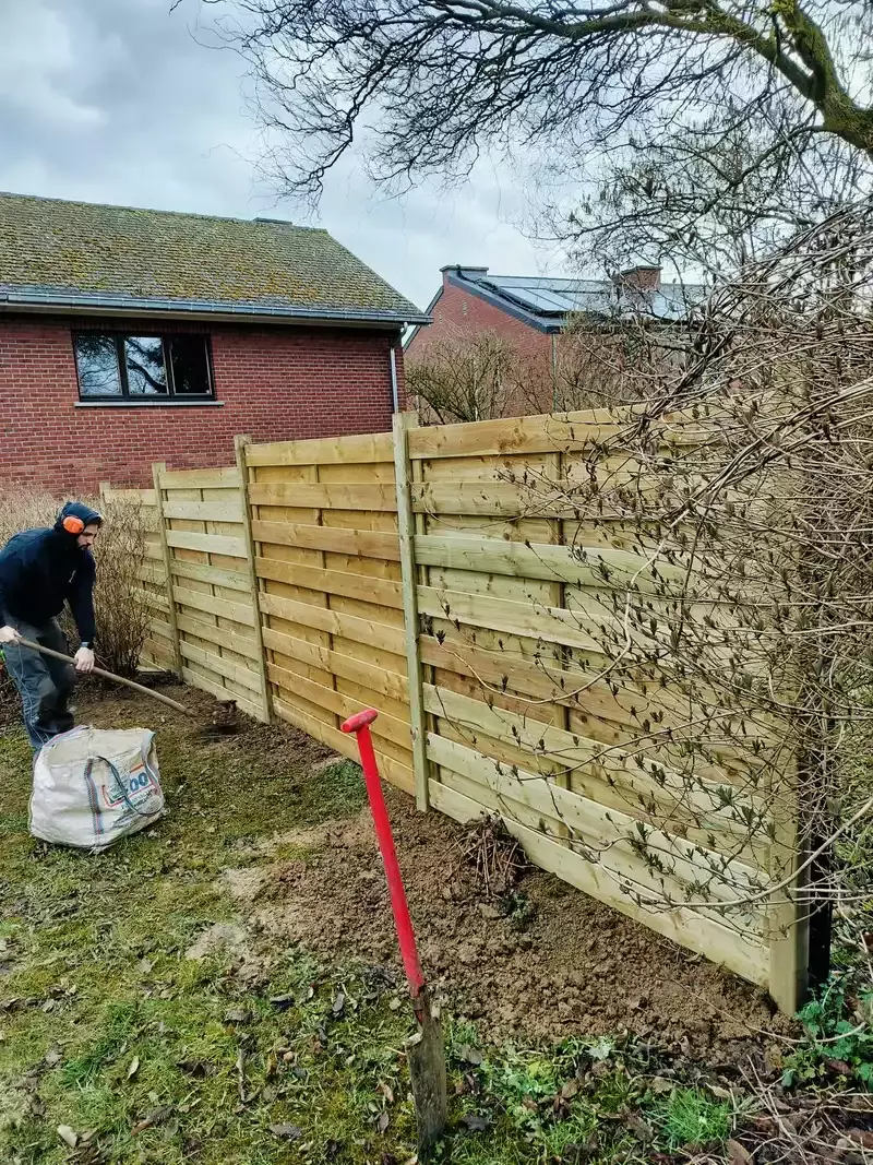 Tuinaanleg met gevarieerde beplanting door Tuinen Saevels Huldenberg