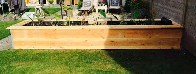 Plantenfilter afgewerkt met steigerhout